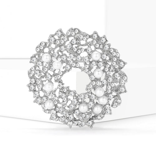 Angled view of the crystal floral wreath brooch
