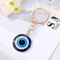 Gold and Silver Tone Round Moon and Key Evil Eye Split Ring Keychains view 2