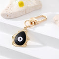 Gold Tone Filigree Oval Teardrop and Star Evil Eye Clip Keychains view 11