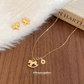 Gold Unicorn Stud Earrings Rocking Horse Coin Necklace view 3