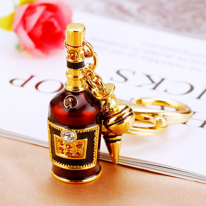 Jeweled Wine Bottle Keychain with Gold Tone Bell and Corkscrew