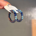 Blue Crystal Textured Hoop Earrings in Silver Tone view 2
