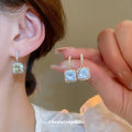 Square Crystal Drop Earrings in White and Pale Green Options view 2