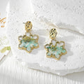 Gold Snowflake Dried Flower Resin Stud Earrings Four Styles view 3
