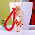 Jeweled Helicopter Keychains in Black and Red with Braided and Clasp Free Loops view 1