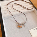 Brown Cord Horse Pendant Necklace With Decorative Metal Details view 6