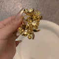 Sculpted Metal Flower Cluster Earrings in Gold and Silver view 6