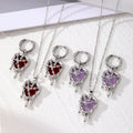 Silver Tone Melting Heart Necklace and Huggie Earring Options view 1