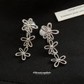 Silver Open Flower Linear Clip On Earrings Statement Jewelry Design view 2