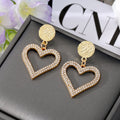 Gold Tone Crystal Open Heart Drop Stud Earrings in Two Colors view 4