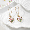 Gold Tone Quatrefoil Pressed Flower Drop Earrings in Six Designs view 2