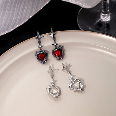 Primary supplied view of heart-center star-link dangle earrings