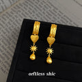 Matte Gold Long Drop Earrings Heart Starburst Teardrop view 4