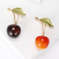 Cherry Brooch with Green Leaf in Two Red Shades for Jackets, Coats, and Scarves view 1