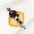 Gold Tone Open Square Brooch With Burgundy Crystal Cascade view 3