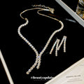 Silver Tone Crystal Y Necklace And Double Row Drop Earring Set view 1
