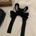Black Multi Loop Bow Hair Claw With Two Long Ribbon Tails view 2