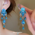 Crystal Teardrop Chandelier Stud Earrings with Polished Metal Details view 4