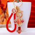 Jeweled Moonstone Ruyi Keychains with Braided and Bare Wrist Loops view 3