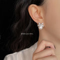 Silver Crystal Bow Pearl Drop Stud Earrings Metal Pair view 2