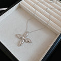 Silver Tone Crystal Cross and Star Pendant Necklace view 6