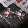 Clear Resin Flower Stud Earrings with Faceted Centers in Three Colors view 3