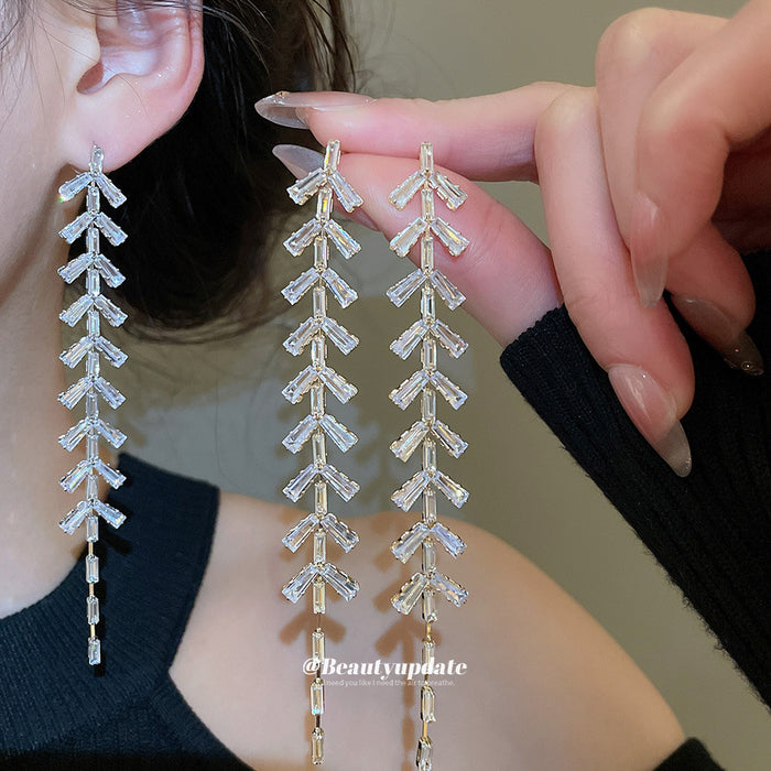 Crystal Leaf Long Drop Earrings With Polished Metal Tone Details