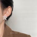 White Pearl Five Petal Flower Stud Earrings Gold Centers view 2