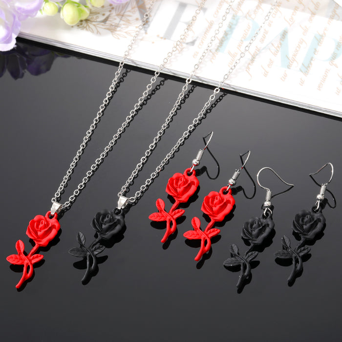 Gold Tone Red and Black Rose Pendant Necklace and Hook Earrings