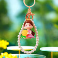 Pearl Loop Cartoon Girl Keychains in Three Sunflower Dress and Hat Designs view 2