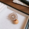 Tan Sphere Coil