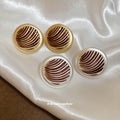 Striped Round Stud Earrings in Silver and Gold with Polished Details view 2