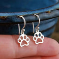 Silver Tone Paw Print Drop Earrings Polished Metal Jewelry view 1