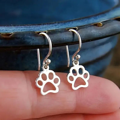 Silver Tone Paw Print Drop Earrings Polished Metal Jewelry alternate close-up view