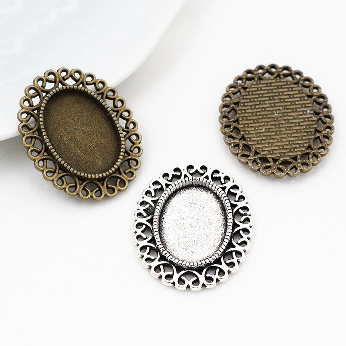 Vine Scroll Oval Pendant Settings in Two Antique Finishes
