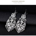 Silver Tone Crystal Scroll Teardrop Openwork Crystal Metal Dangle Earrings view 4