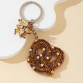 Beaded Bronze Knot Keychain With Rhinestone Flower Charm view 4
