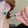 Silver Tone Crystal Flower Stud Earrings With Bright Green Centers view 2