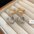 Interlocking Double Hoop Clip On Earrings in Gold and Silver view 3