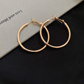Slim Polished Metal Hoop Earrings in Three Size and Color Options view 6