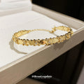 Gold Tone Oval Plate And Tiny Crystal Flower Link Bracelet view 3