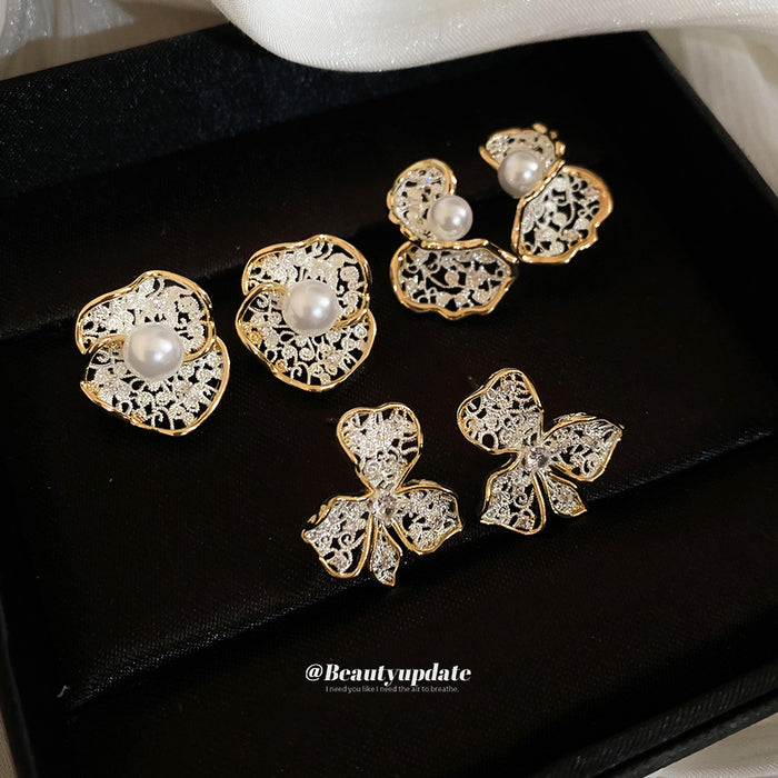 Gold And Silver Floral Stud Earrings In Three Sculpted Designs