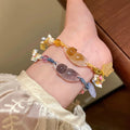 Purple Gray Or Amber Resin Cat And Star Braided Cord Bracelet view 1