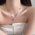Blue Bead Cross Pendant Necklace with Gold Tone Chain view 3