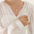 Gold Wavy Square Faux Pearl Pendant Chain Necklace view 1