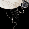 Layered Four Strand Pendant Necklace in Polished Silver or Gold Tone view 6