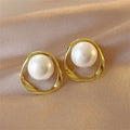 Gold Tone Open Geometric Frame White Pearl Stud Earrings view 1