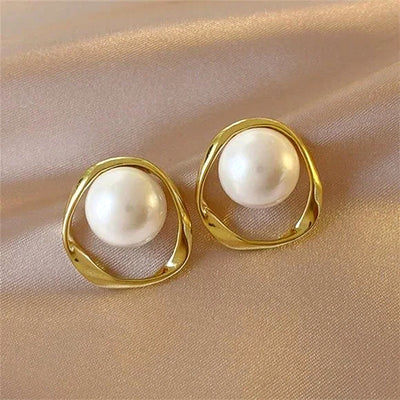 Gold open geometric frame white pearl stud earrings pair front view