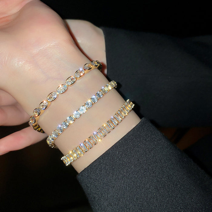 Three Gold Tone Crystal Cuff Bracelets In Distinct Stone Shapes