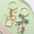 Flower Charm Keychains Featuring Green Butterfly Across 31 Pictured Variations view 3